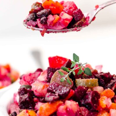 A spoonful of the vegan Beetroot Carrot Potato Salad or Vinehret Recipe in the air
