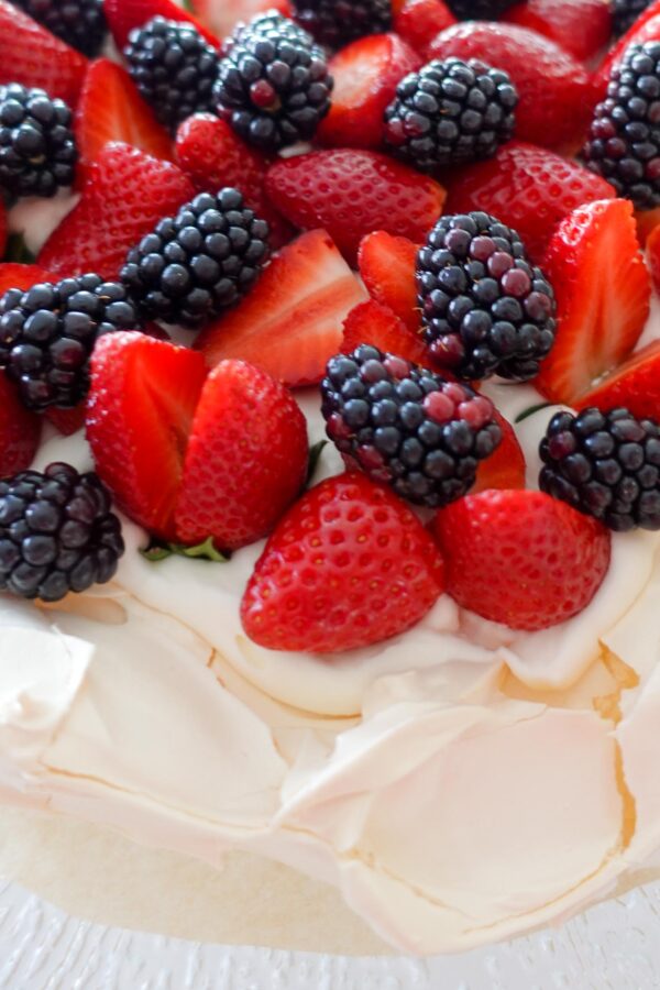 Strawberry Blackberry Pavlova on a beautiful plate