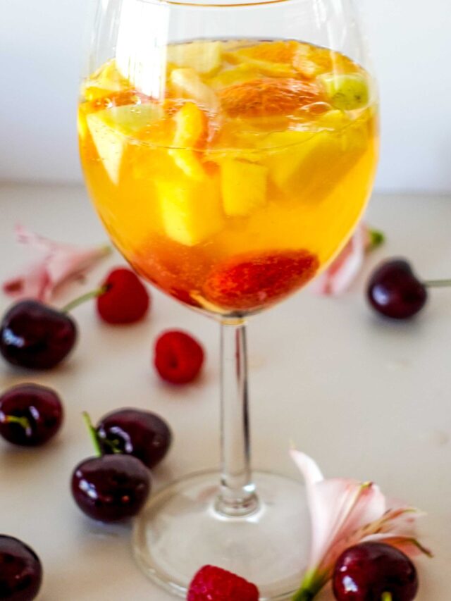 How to Make Sparkling Mango Raspberry Sangria - Helena Recipes