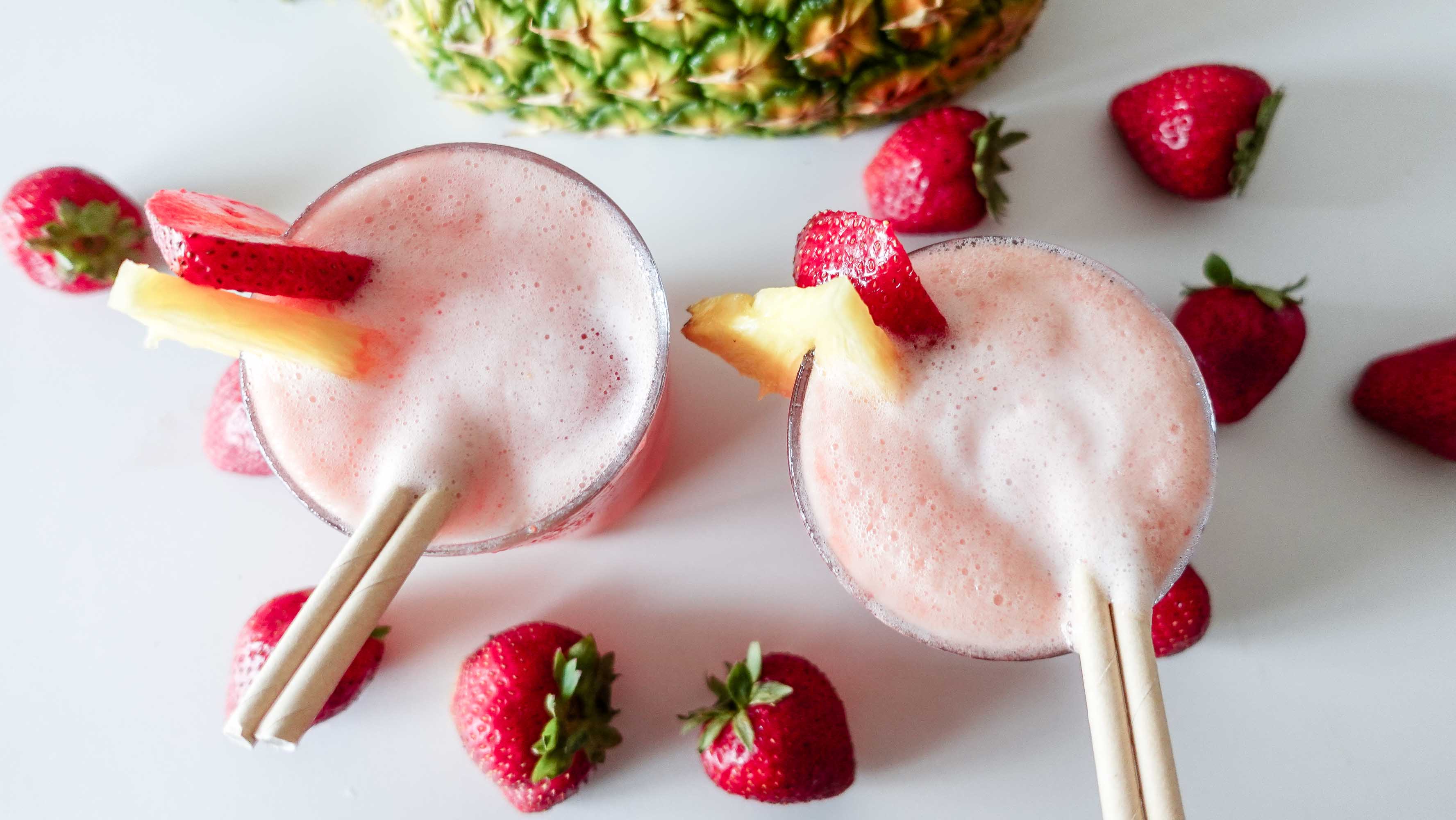 Rum Strawberry Cocktail with strawberries and pineapple