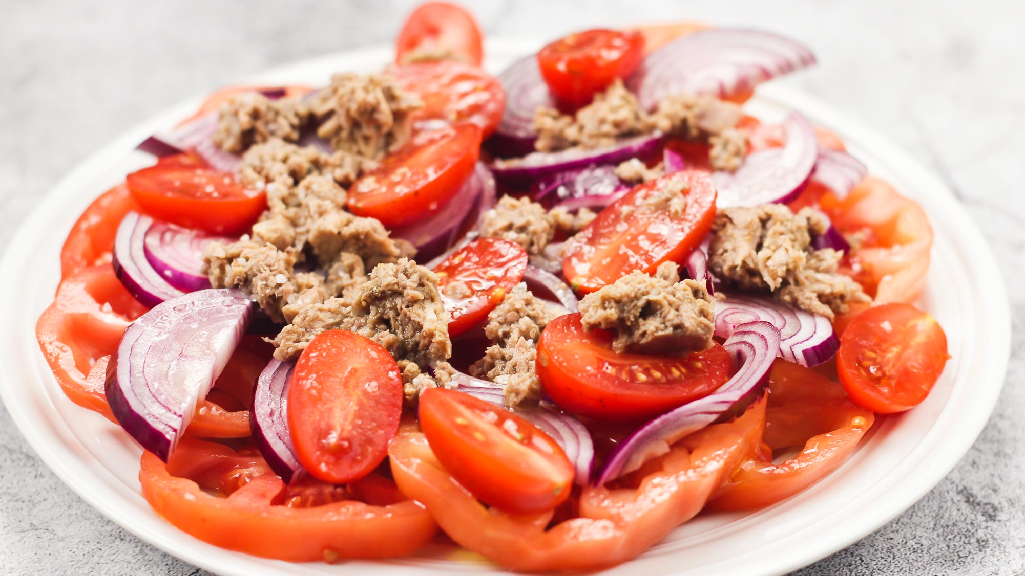 Tuna Tomato salad on a plate.