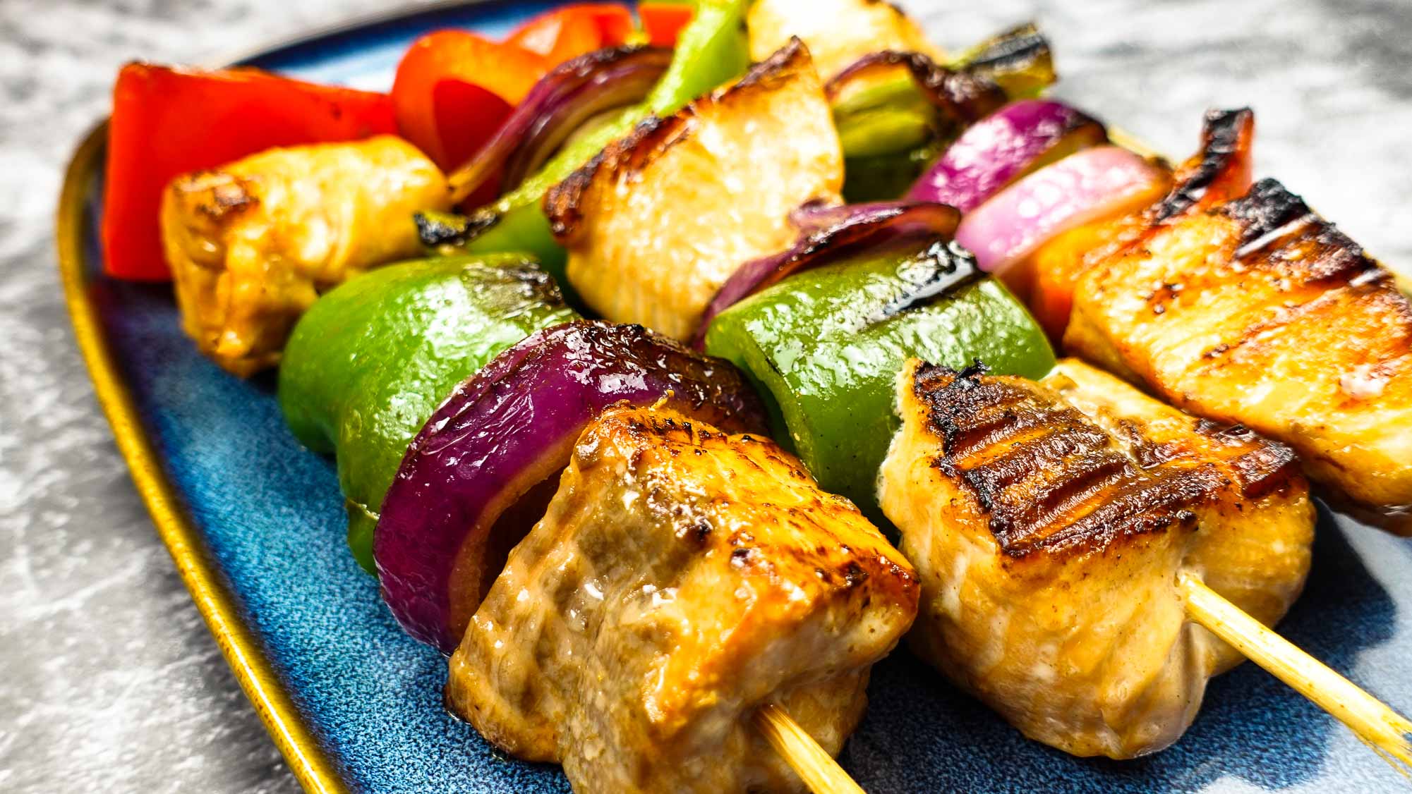 Skewers with meat and vegetables on sticks.