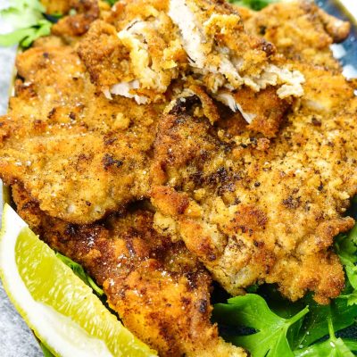 Mediterranean Veal Cutlets with lemon and parsley.